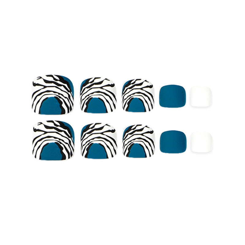 Artful toenail design in modern zebra pattern Stornfield