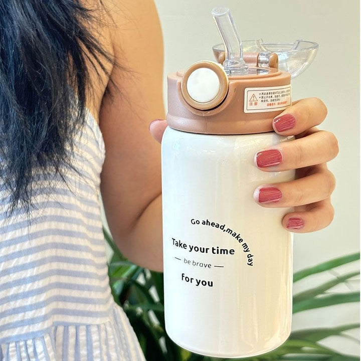 Women's insulated drinking bottle with innovative flip lid and practical handle Stornfield