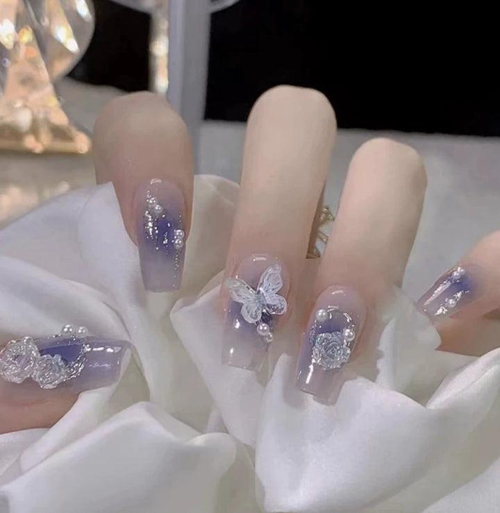 Elegant nail design with pearl embellishment Stornfield
