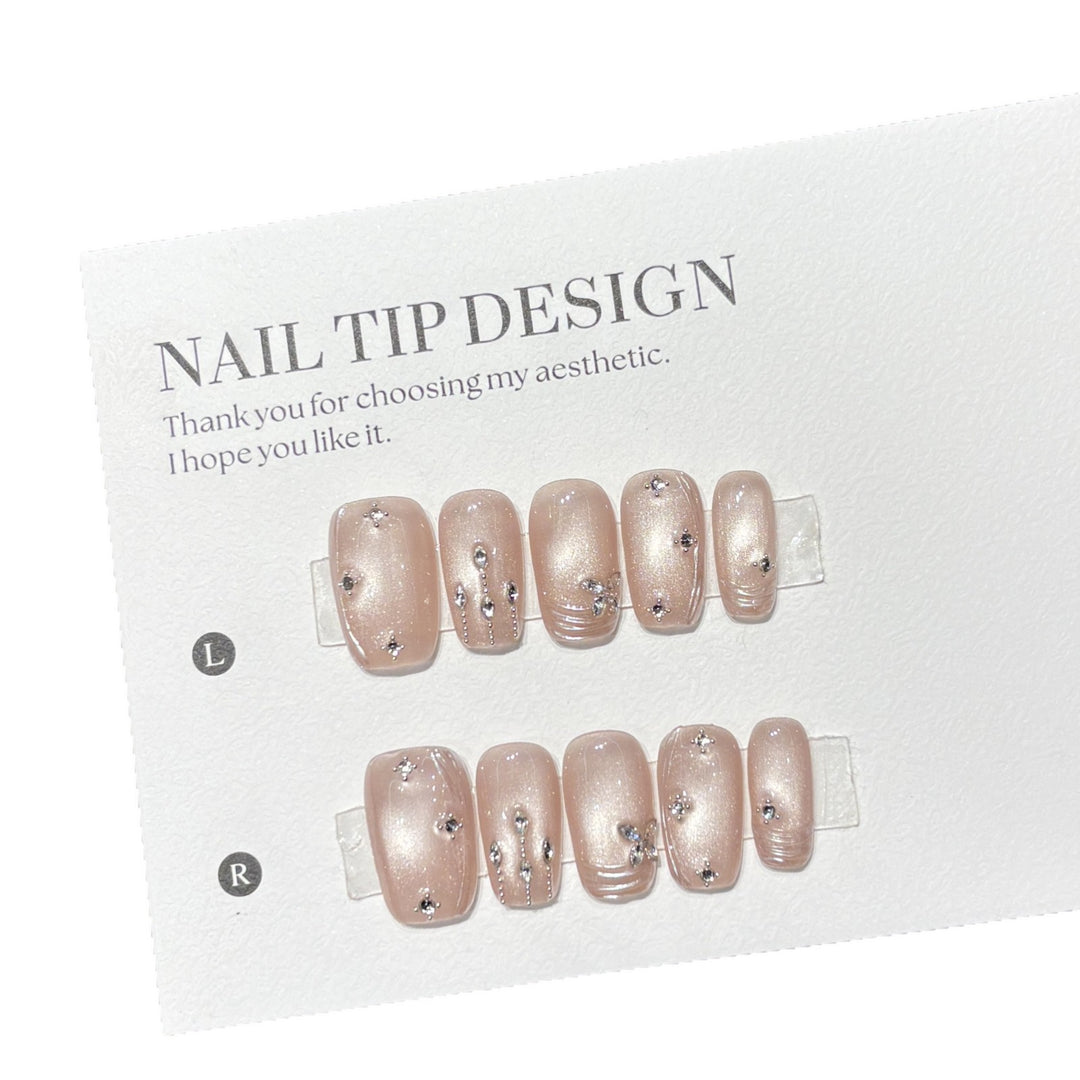 Artificial nails with glamorous rhinestone design Stornfield
