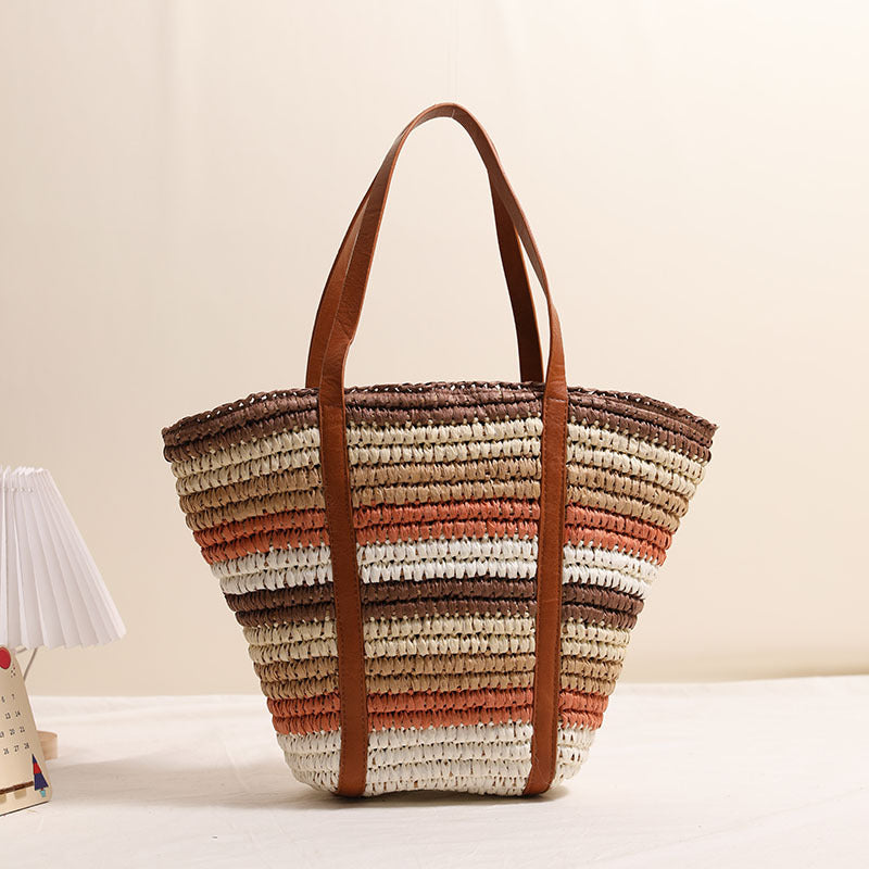 Braided straw tote bag with sturdy leather handles Stornfield