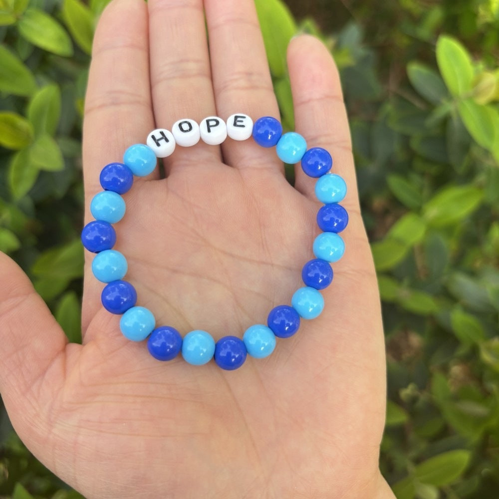 Friendship bracelet made of pastel beads Stornfield
