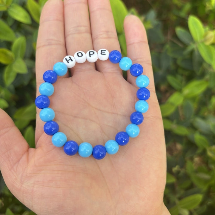 Friendship bracelet made of pastel beads Stornfield