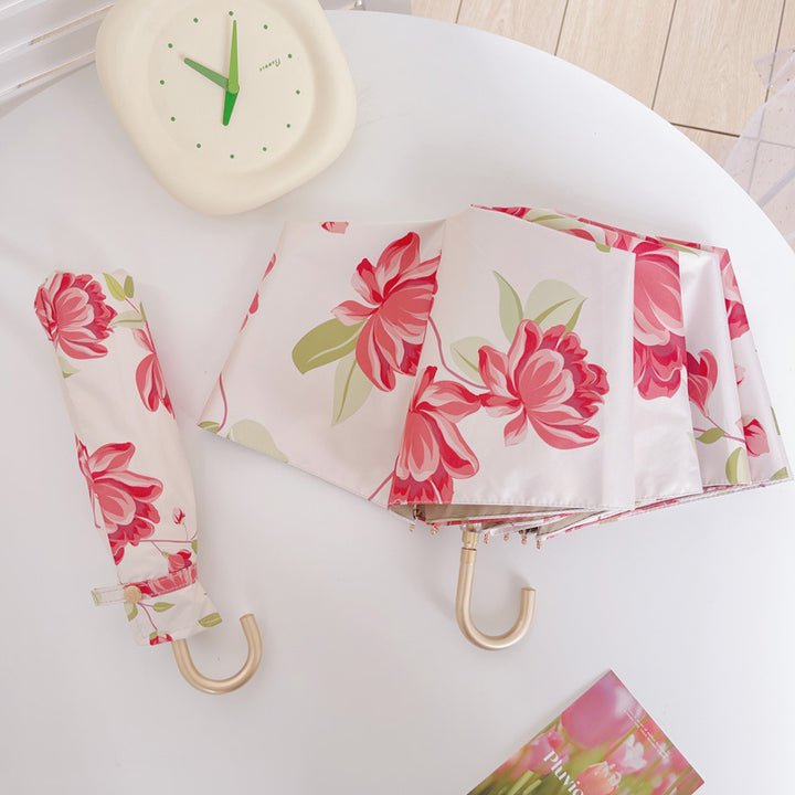 Ladies elegant folding umbrella with fruity design Stornfield
