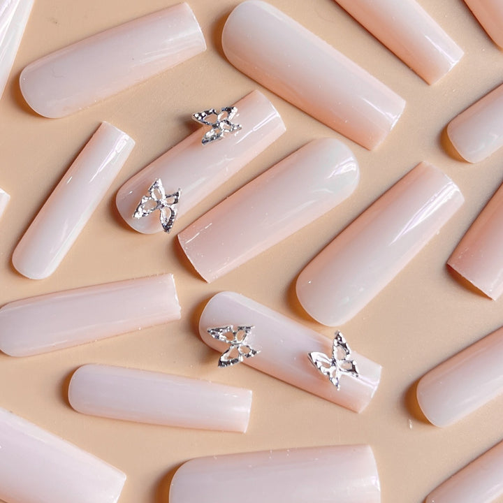 Elegant Long Coffin Nail Extensions with Butterfly Accents Stornfield