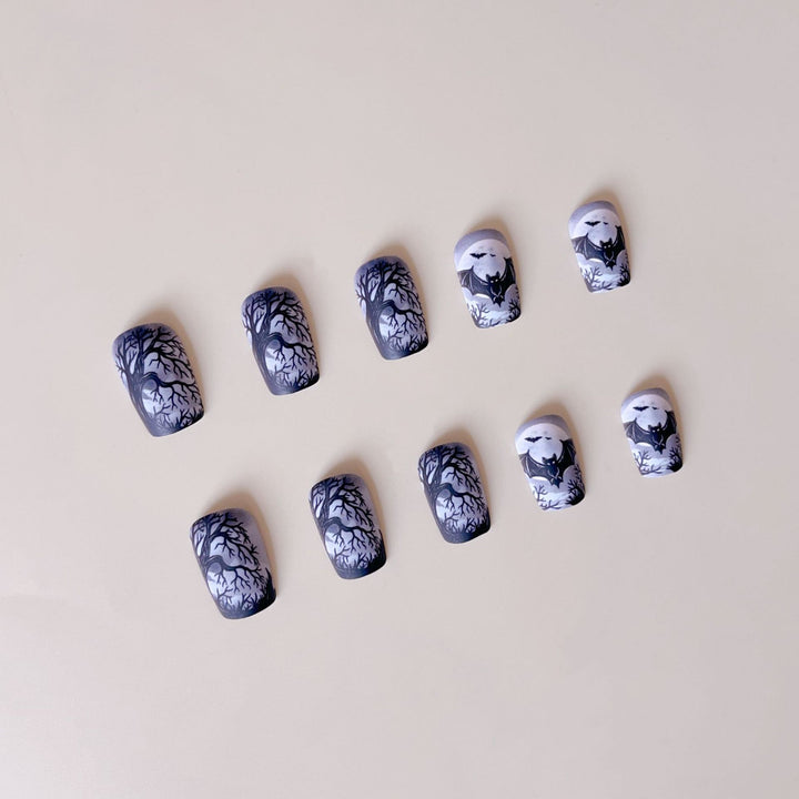 Nail art set with spooky Halloween design and intricate 3D decorations Stornfield