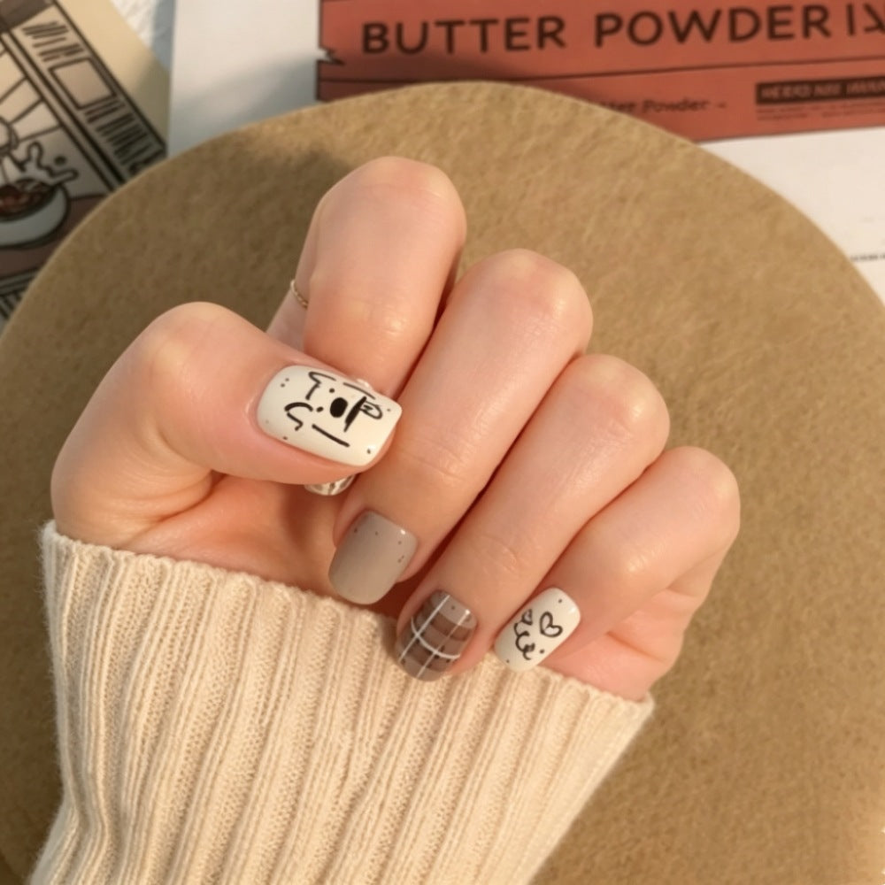 Artistic Press-On Nail Set with Unique Character Designs Stornfield
