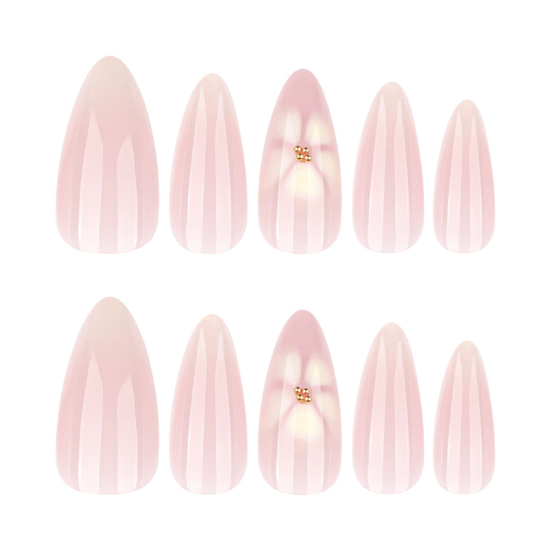 Elegant Stiletto Nails with Floral Accents Stornfield
