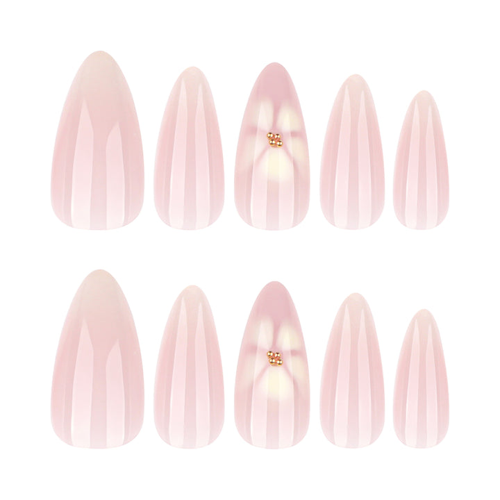 Elegant Stiletto Nails with Floral Accents Stornfield