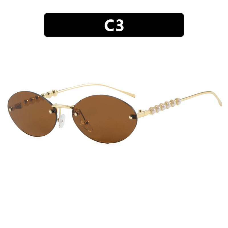 Women's stylish oval sunglasses with elegant embellishments Stornfield