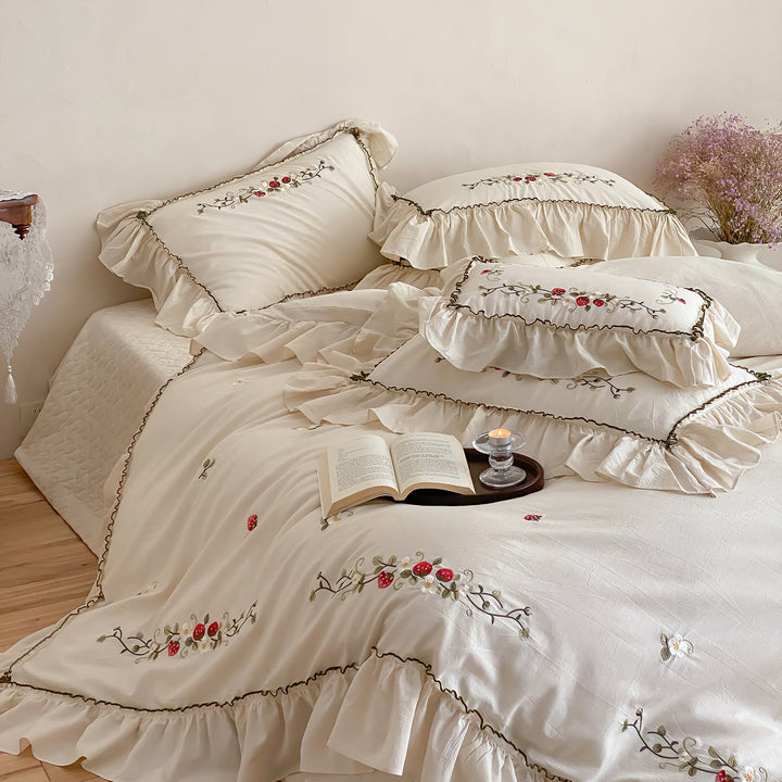 Country house style embroidered bedding set with strawberry motif and ruffle