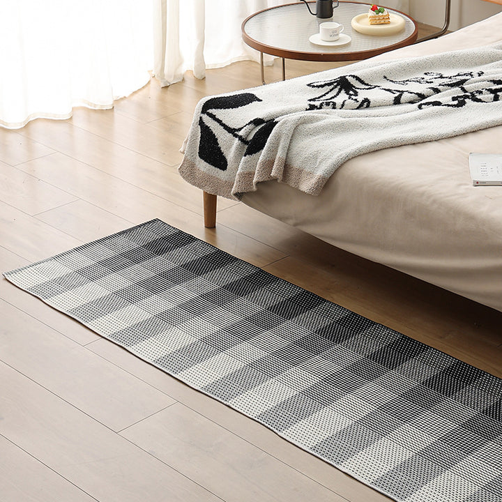 Flat runner rug made of cotton blend with checked woven structure