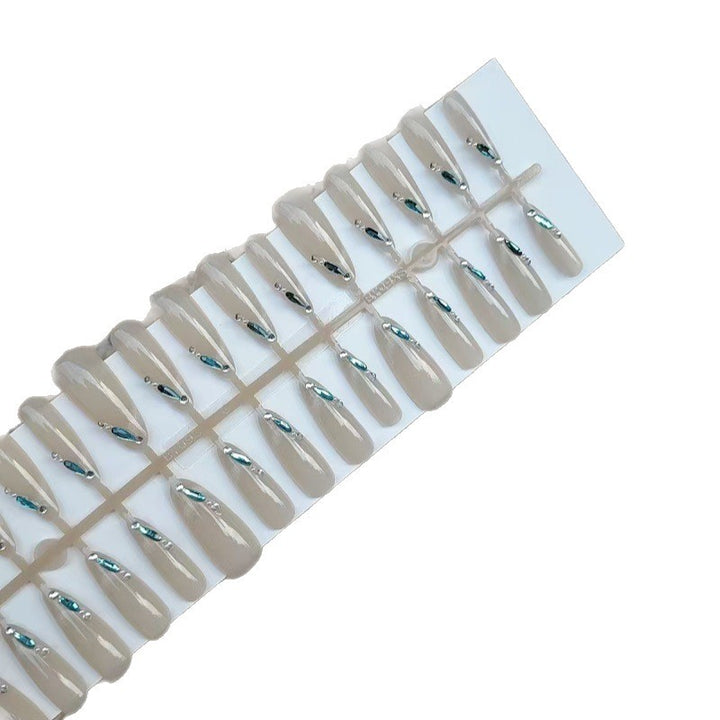 Artificial nails with glitter accents and elegant shapes Stornfield