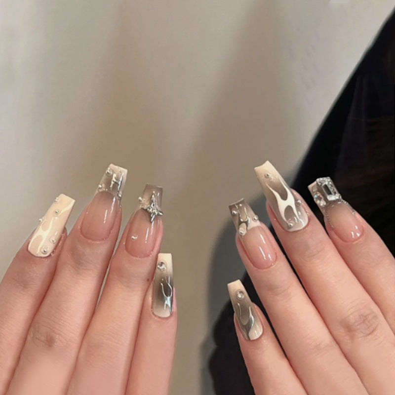 Artful nail extensions with trendy shine and design Stornfield
