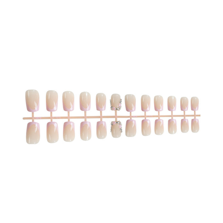 Artificial nails with romantic pink tips Stornfield