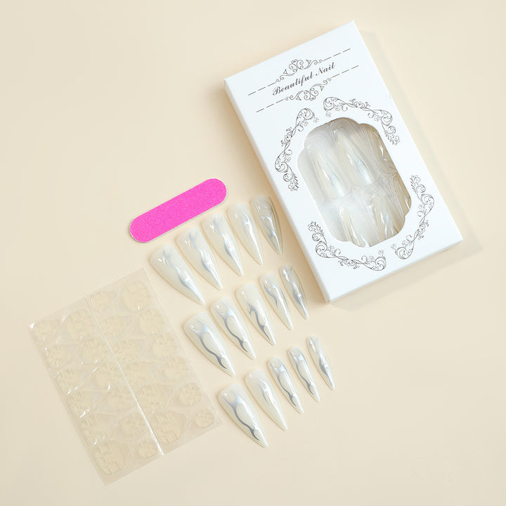 Creative nail set with pointed artificial nails and accessories Stornfield