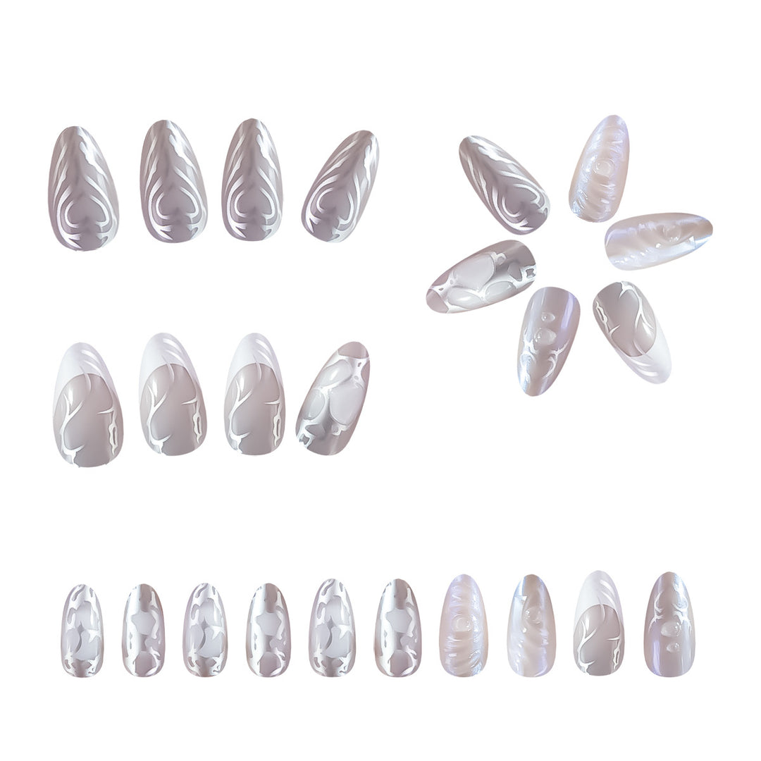 Elegant Stiletto Nail Extensions with Decorative Silver Accents Stornfield