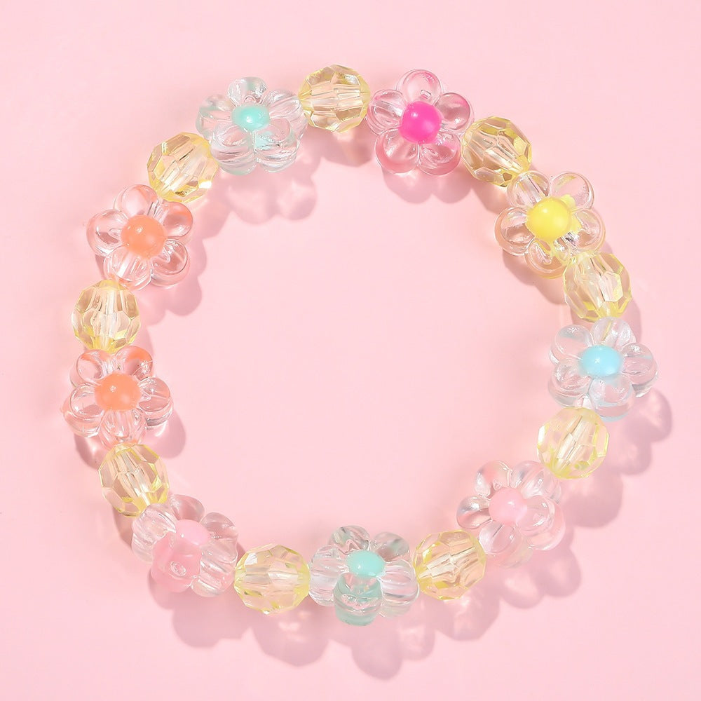 Friendship bracelet with colorful flower motifs Stornfield