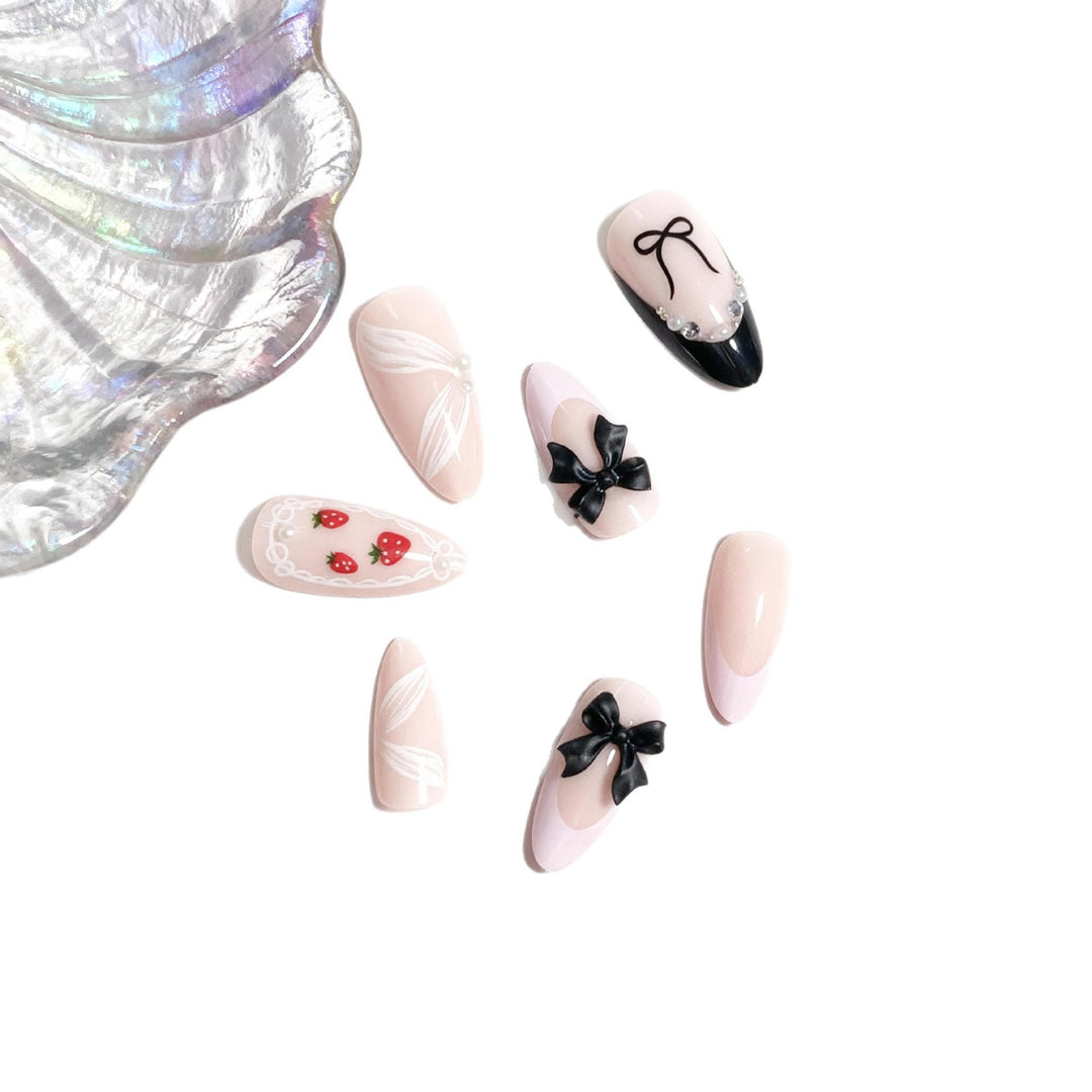 Artistic Press-On Nail Set with Bow and Berry Design Stornfield