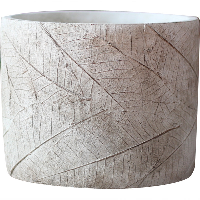 Decorative plant container made of handmade ceramic with leaf pattern Stornfield