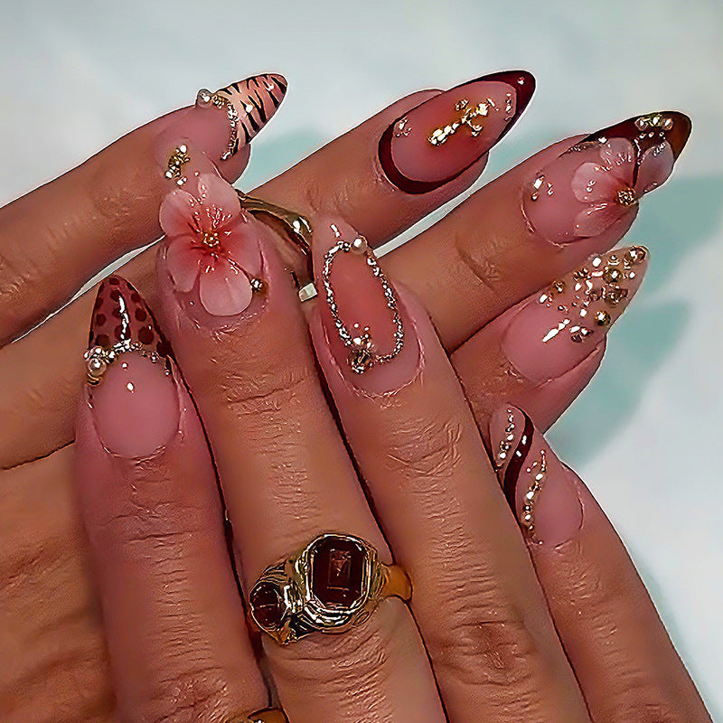 Creative nail art set with floral and glamorous accents Stornfield