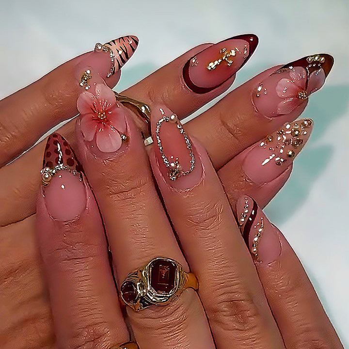 Creative nail art set with floral and glamorous accents Stornfield