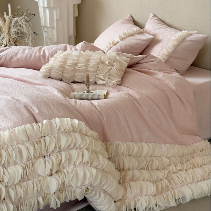 Romantic ruffle bedding set with layered frill and quilted bedspread