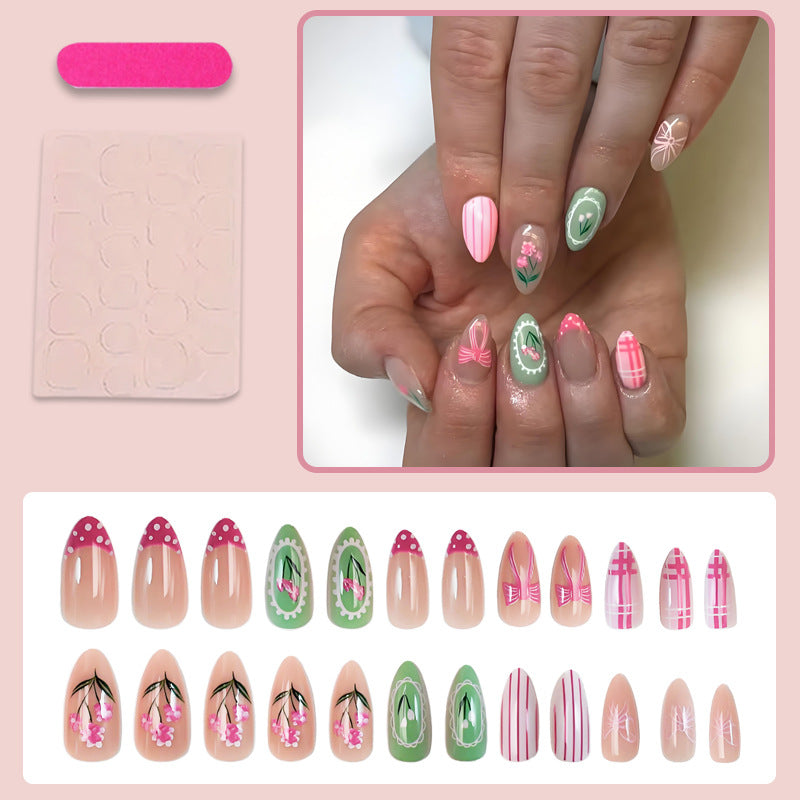 Acrylic nail set with floral and playful designs Stornfield