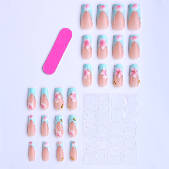 Artificial fingernails with floral design and glitter accents Stornfield