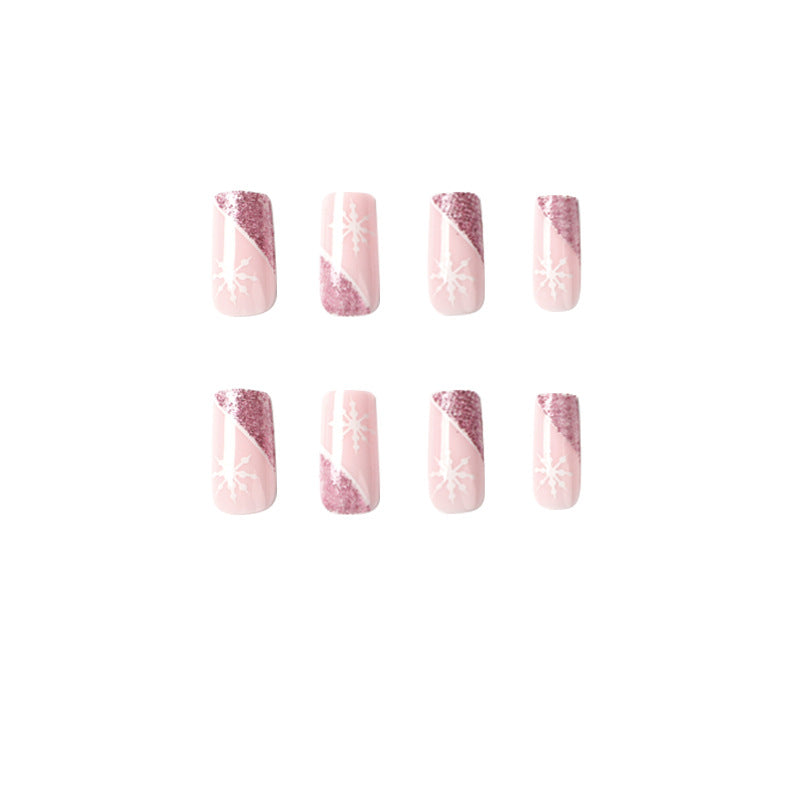 Artful Nail Extensions with Festive Glitter and Snowflake Design Stornfield