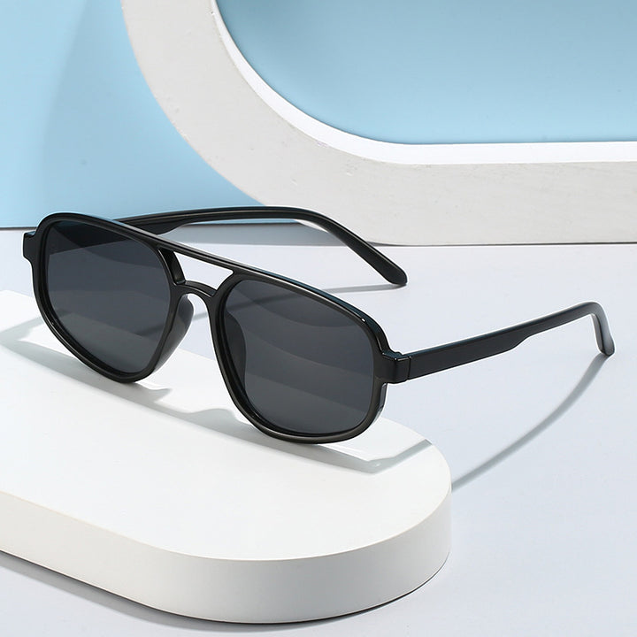 Women's fashionable sunglasses with wide frame and UV protection Stornfield