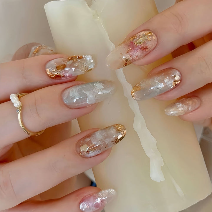 Artificial nails with glamorous metallic details and sparkling design Stornfield