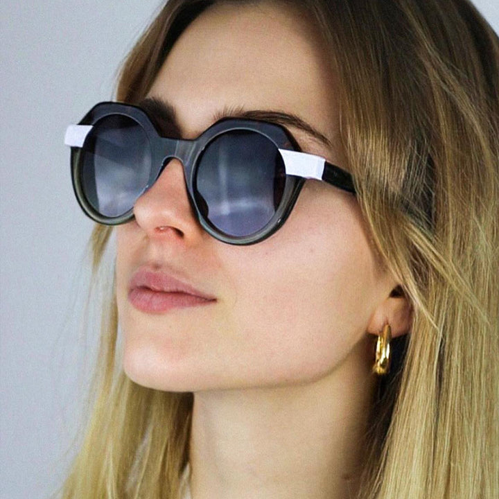 Ladies extravagant round sunglasses with colored accented frame Stornfield