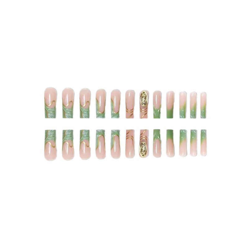 Artistic Press-On Nail Extensions with Gold Detailing Stornfield