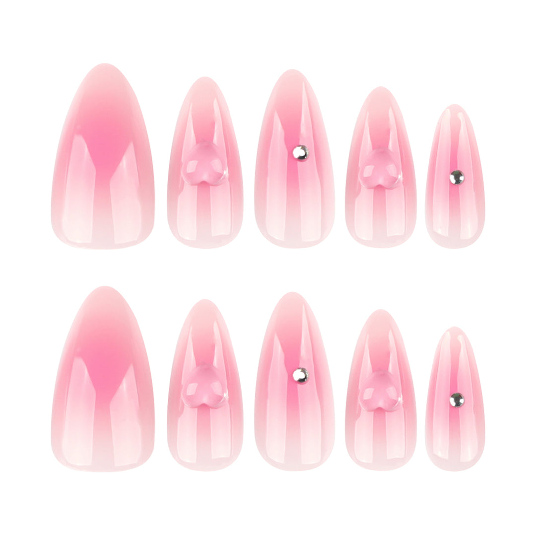 Artful stiletto nails with heart design and glitter accents Stornfield