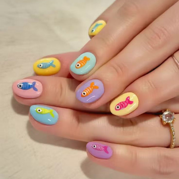 Creative artificial nails with playful fish design Stornfield