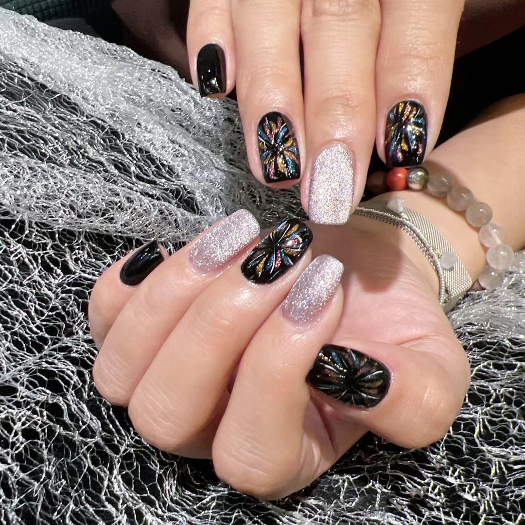 Artificial nails with glitter and floral patterns Stornfield