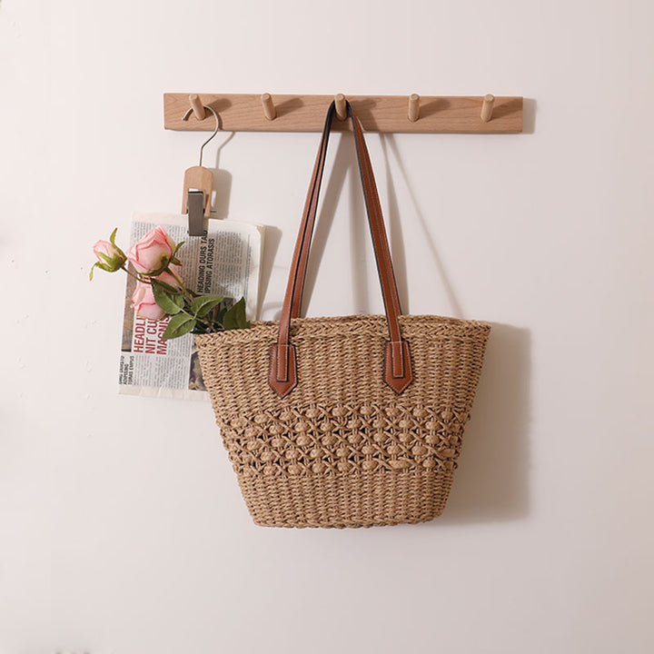 Handcrafted rattan basket bag with elegant leather accents Stornfield