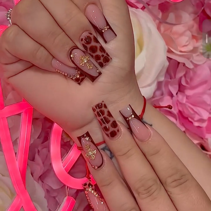 Nail art set with modern leopard patterns and sparkling accents Stornfield