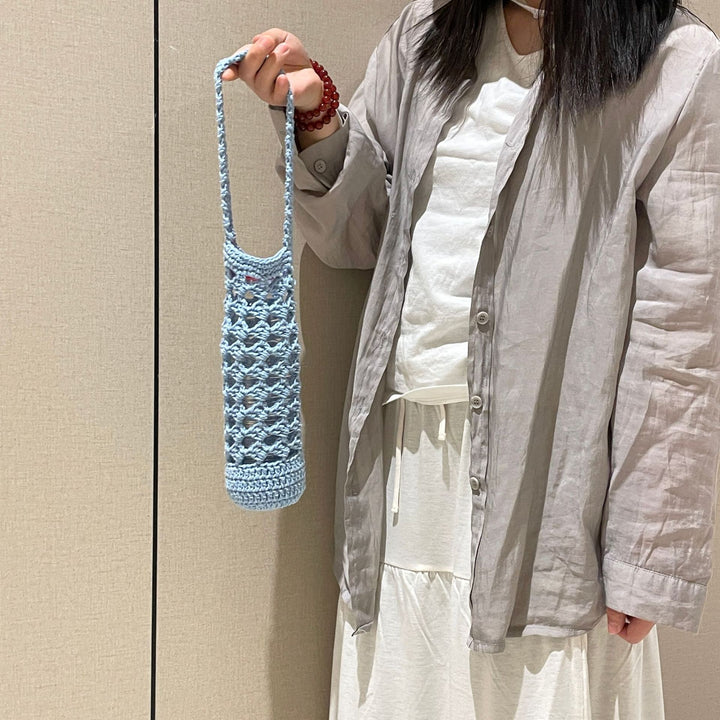 Hand-knotted bottle carrier Stornfield