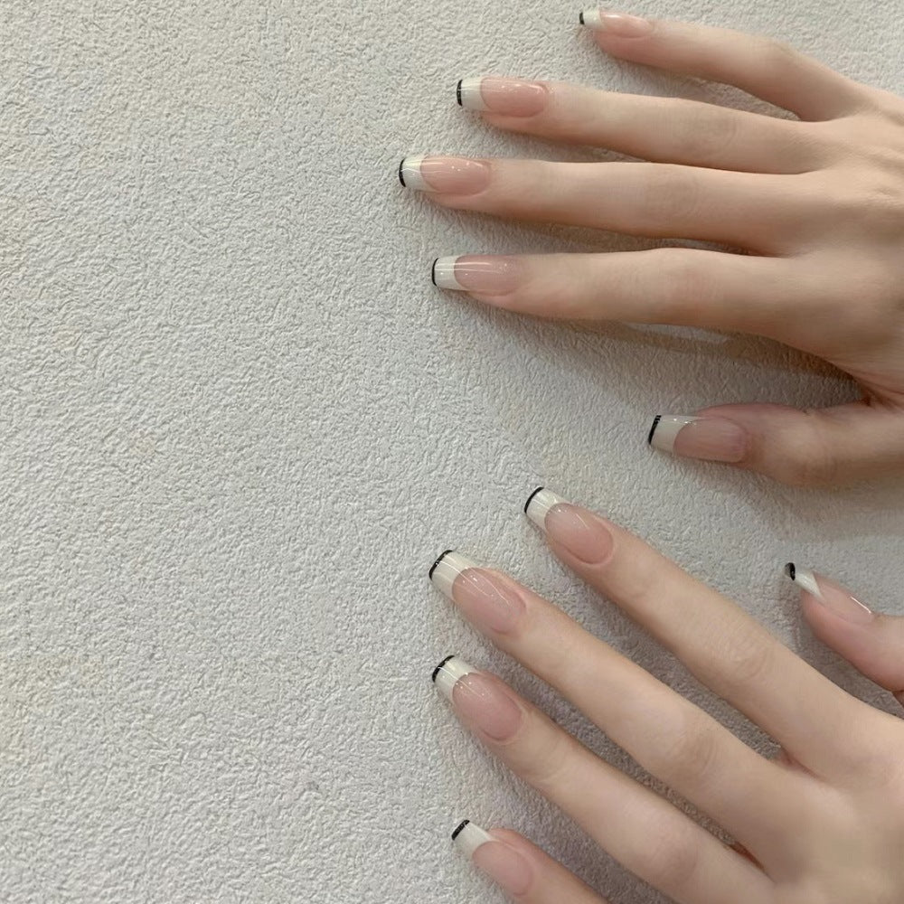 French Tip Press-On Nails with Elegant Black Detailing Stornfield