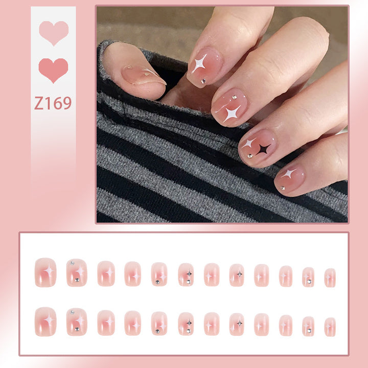 Acrylic nail set with sparkling star decorations and elegant accents Stornfield
