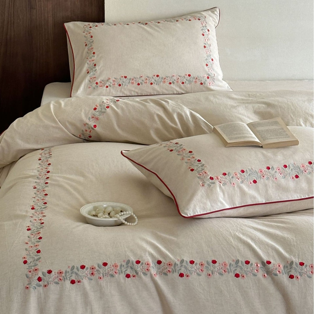Linen bedding set with floral embroidery border