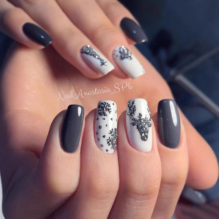 Artistic Winter-Themed Nail Art Stornfield