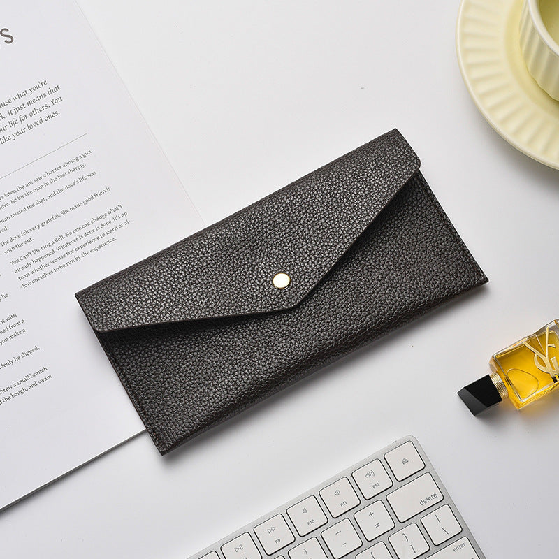 Elegant Textured Leather Clutch Wallet Stornfield