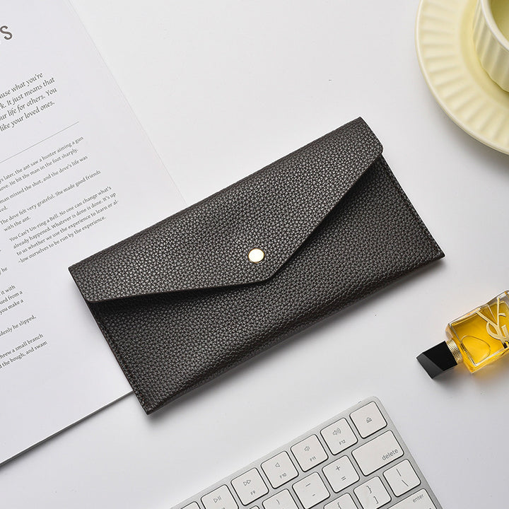 Elegant Textured Leather Clutch Wallet Stornfield