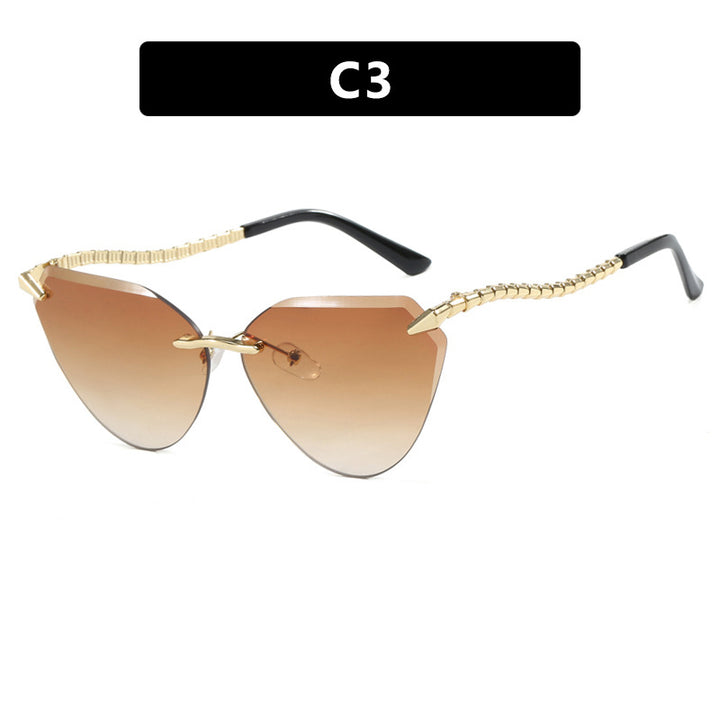Women's Cat-Eye Sunglasses with unique gold frame design and protective lenses Stornfield