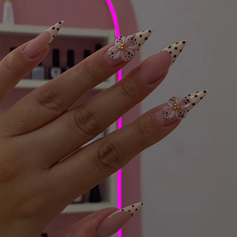 Art nail set with elegant flower and dot designs Stornfield