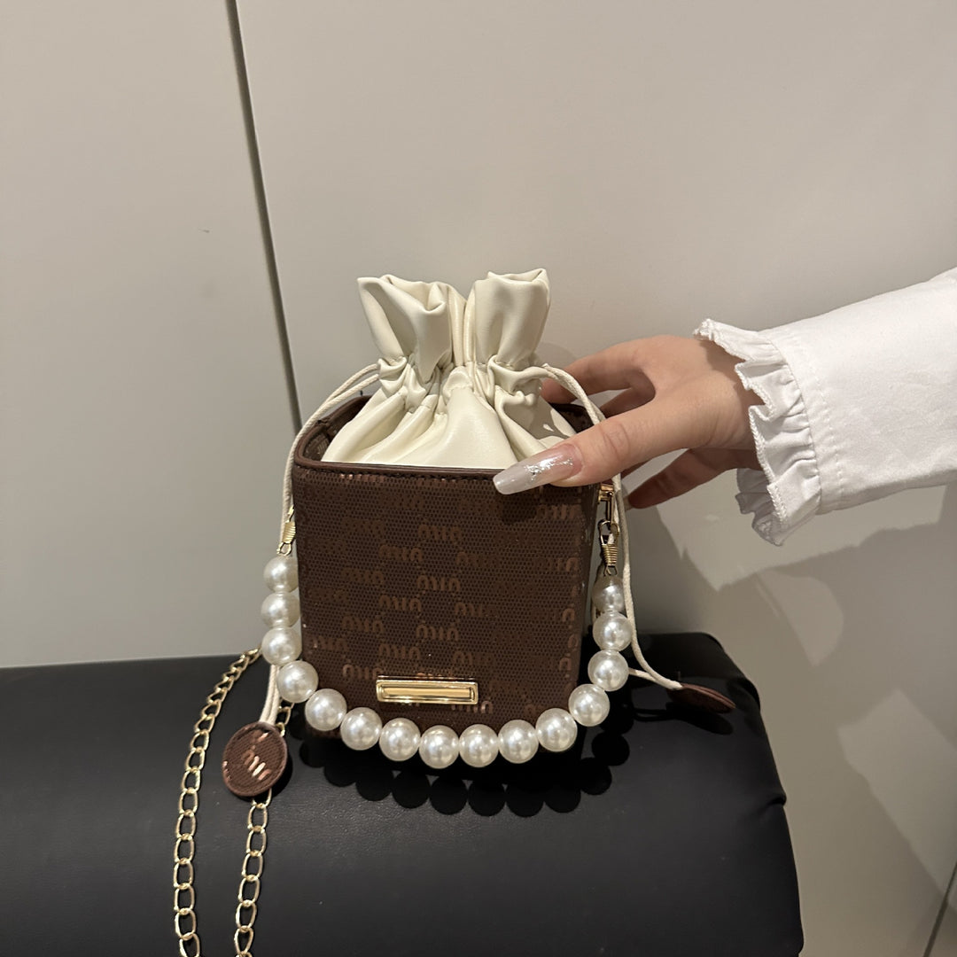 Elegant Pearl-Handled Mini Bucket Bag Stornfield