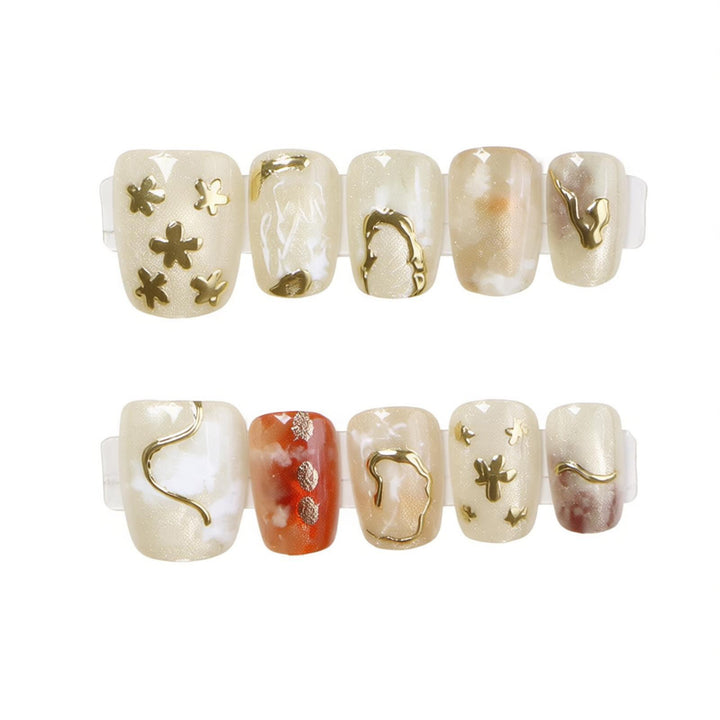 Elegant Press-On Nail Art Set with Unique Metallic Designs Stornfield